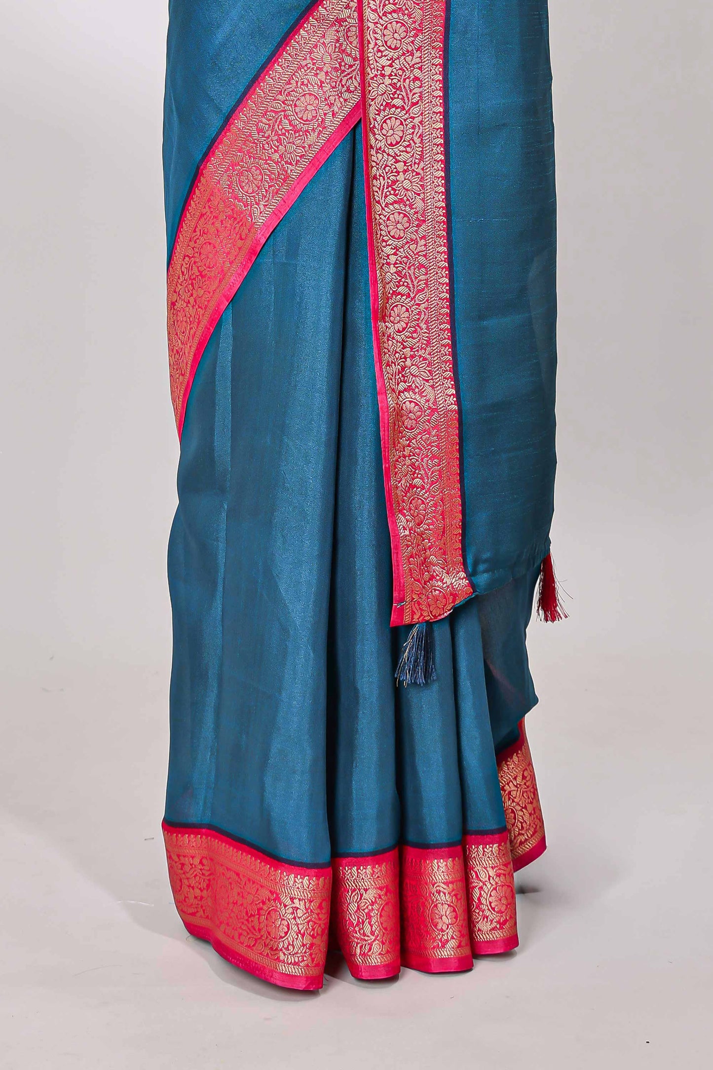 Blue marsh mellow plain saree with contrast gold zari border and butta blouse