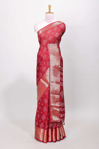 Red marsh mellow bandhani dot saree with gold zari border and butta blouse