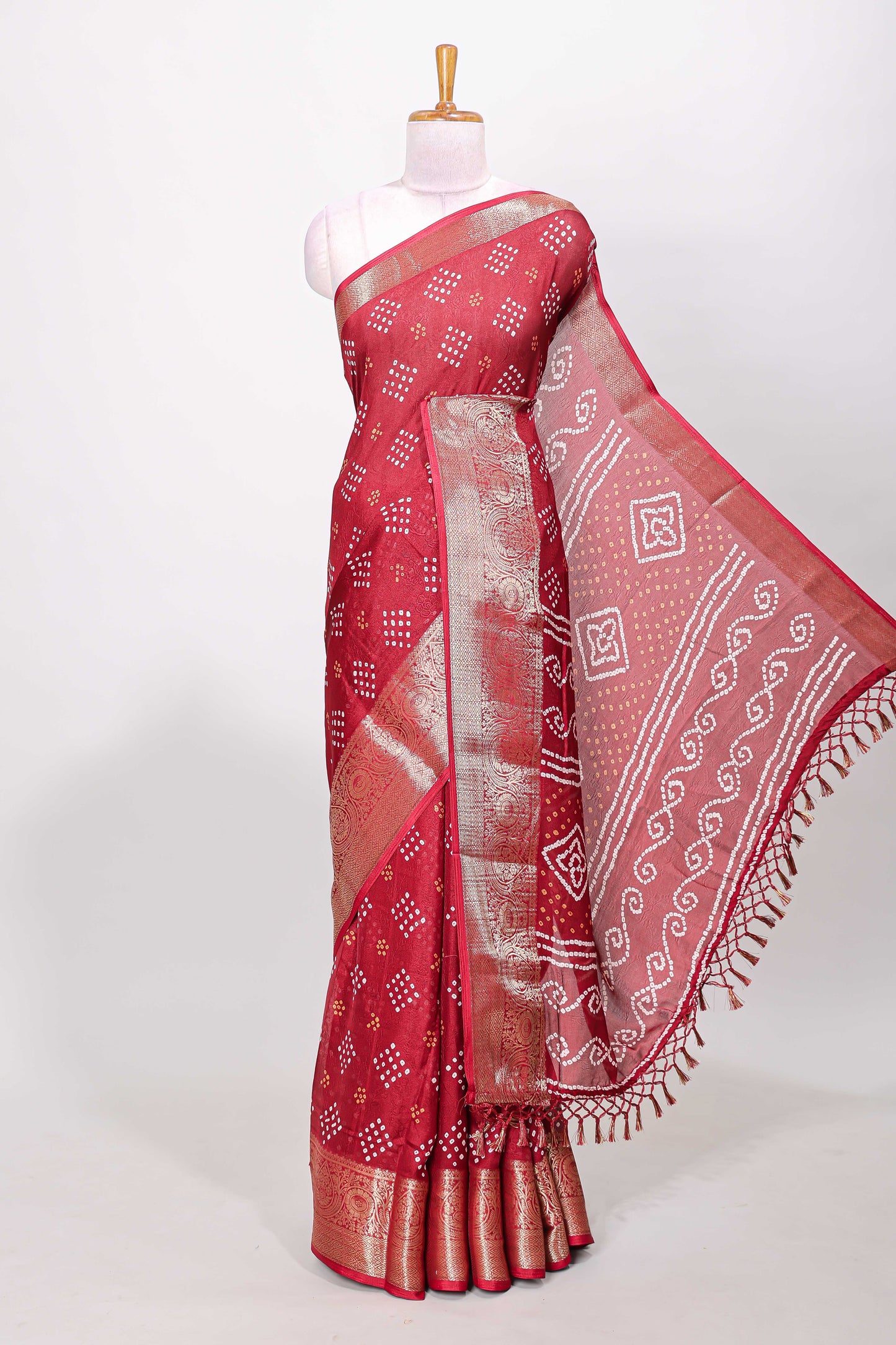 Red marsh mellow bandhani dot saree with gold zari border and butta blouse
