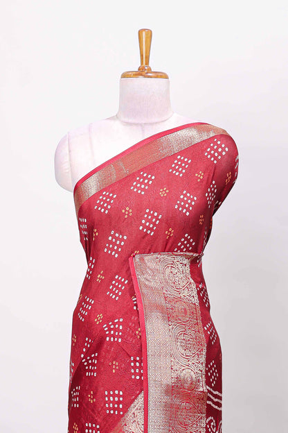 Red marsh mellow bandhani dot saree with gold zari border and butta blouse