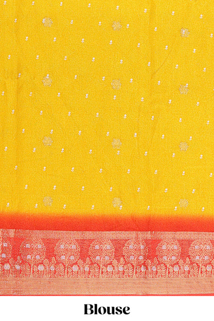 Yellow marsh mellow saree with leaf motifs, contrast border and floral butta blouse