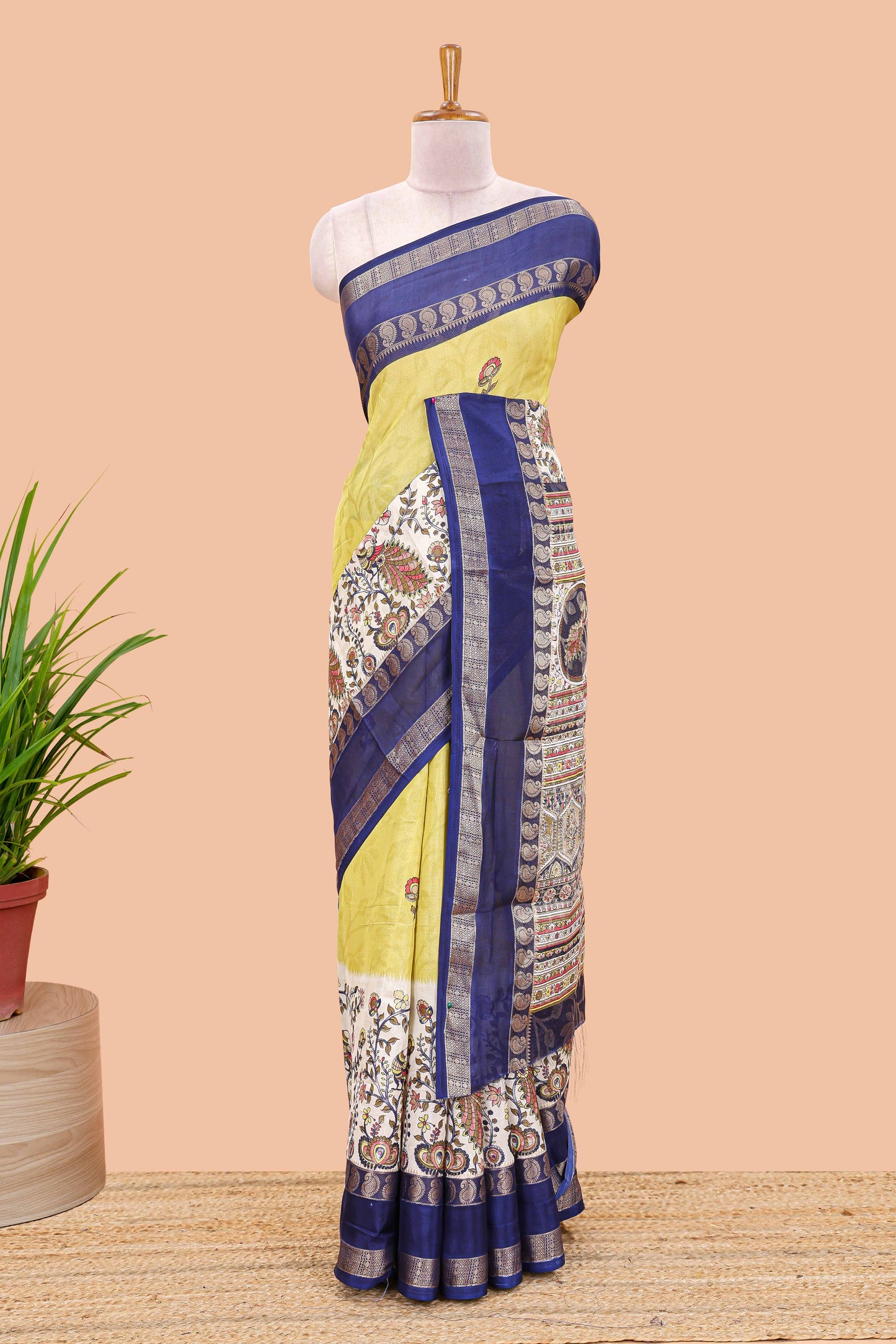 Yellow dola silk floral motifs saree with kalamkari inspired pallu and peacock zari border