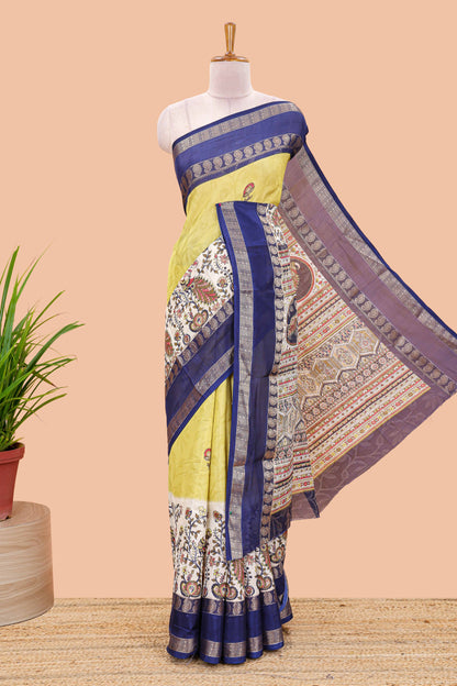 Yellow dola silk floral motifs saree with kalamkari inspired pallu and peacock zari border