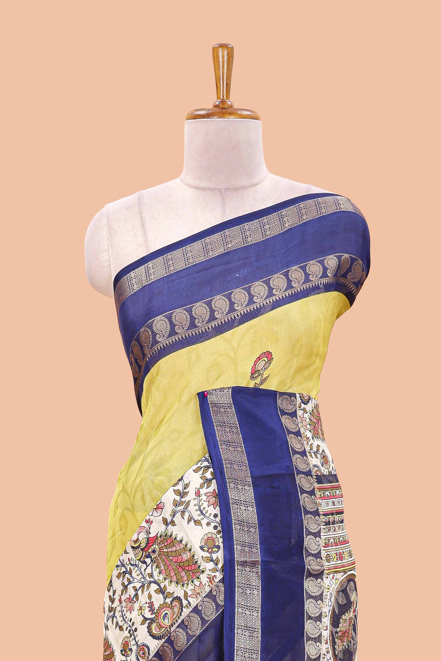 Yellow dola silk floral motifs saree with kalamkari inspired pallu and peacock zari border