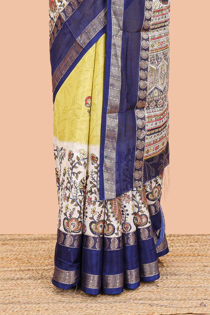 Yellow dola silk floral motifs saree with kalamkari inspired pallu and peacock zari border