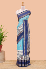 Blue dola silk floral motifs saree with kalamkari inspired pallu and peacock zari border