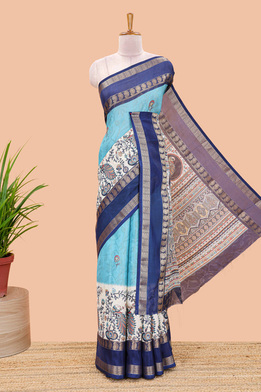 Blue dola silk floral motifs saree with kalamkari inspired pallu and peacock zari border
