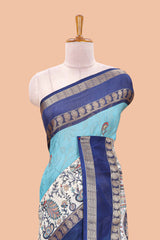 Blue dola silk floral motifs saree with kalamkari inspired pallu and peacock zari border