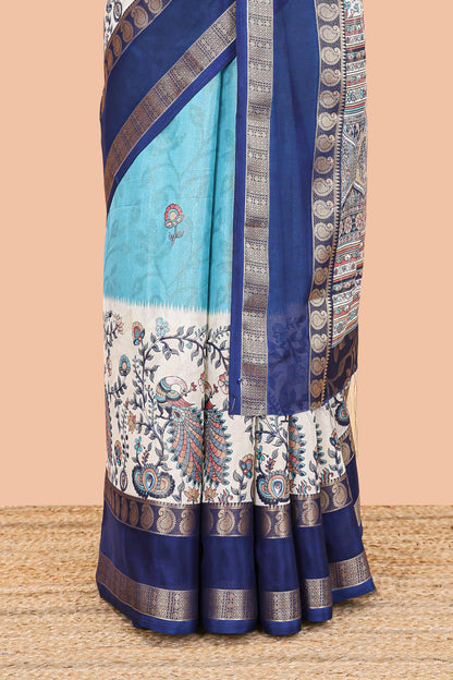 Blue dola silk floral motifs saree with kalamkari inspired pallu and peacock zari border