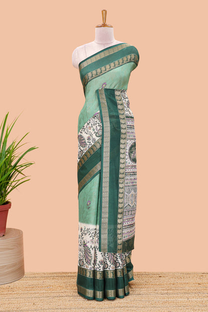 Green dola silk floral motifs saree with kalamkari inspired pallu and peacock zari border
