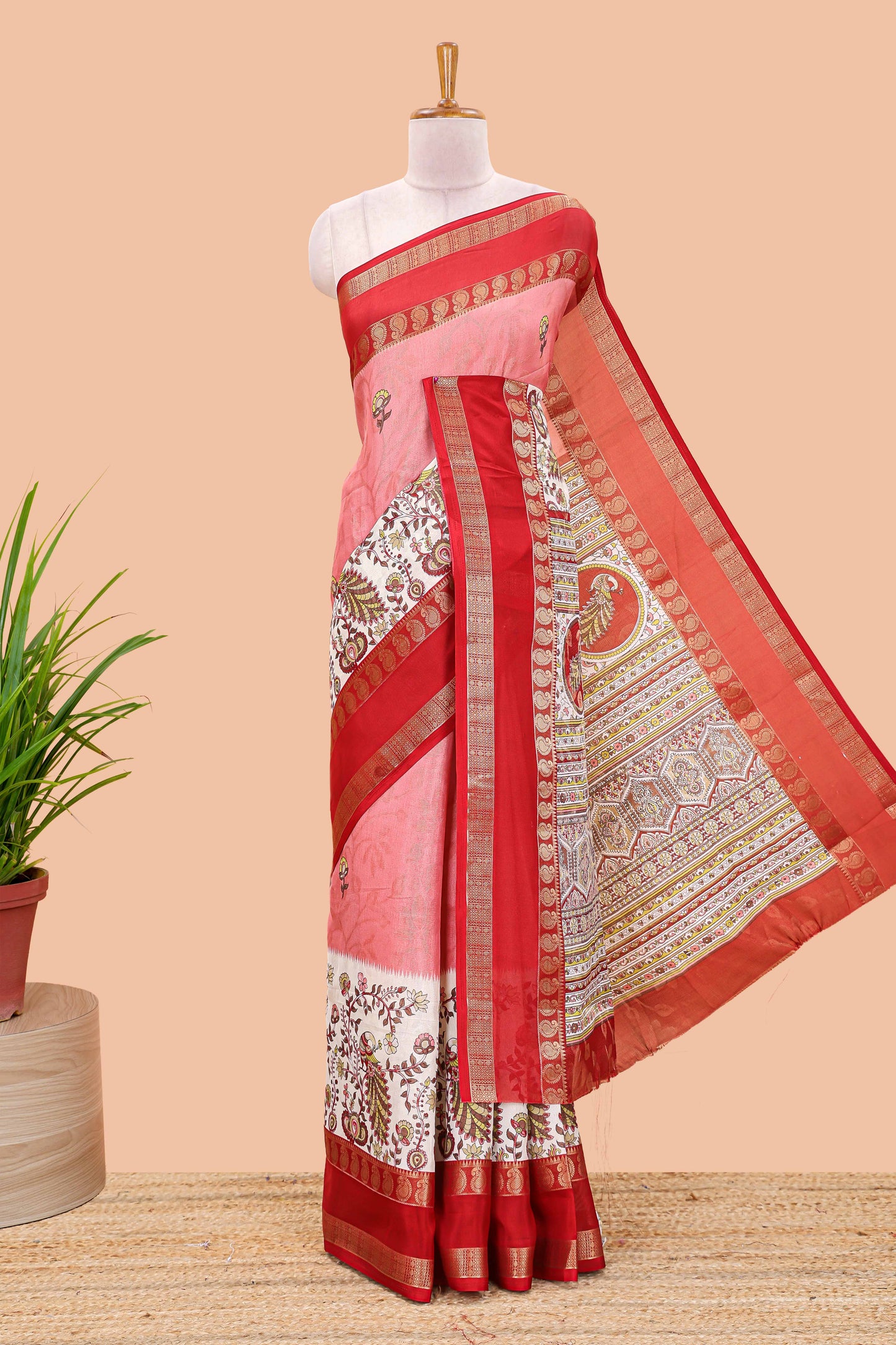 Pink dola silk floral motifs saree with kalamkari inspired pallu and peacock zari border