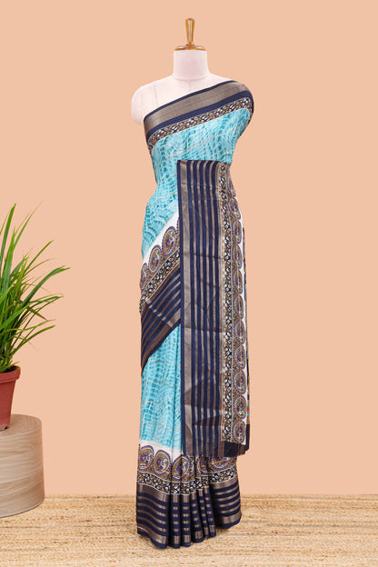 Blue marsh georgette saree with shibori print with gold zari stripes and contrast kalamkari style  peacock pallu