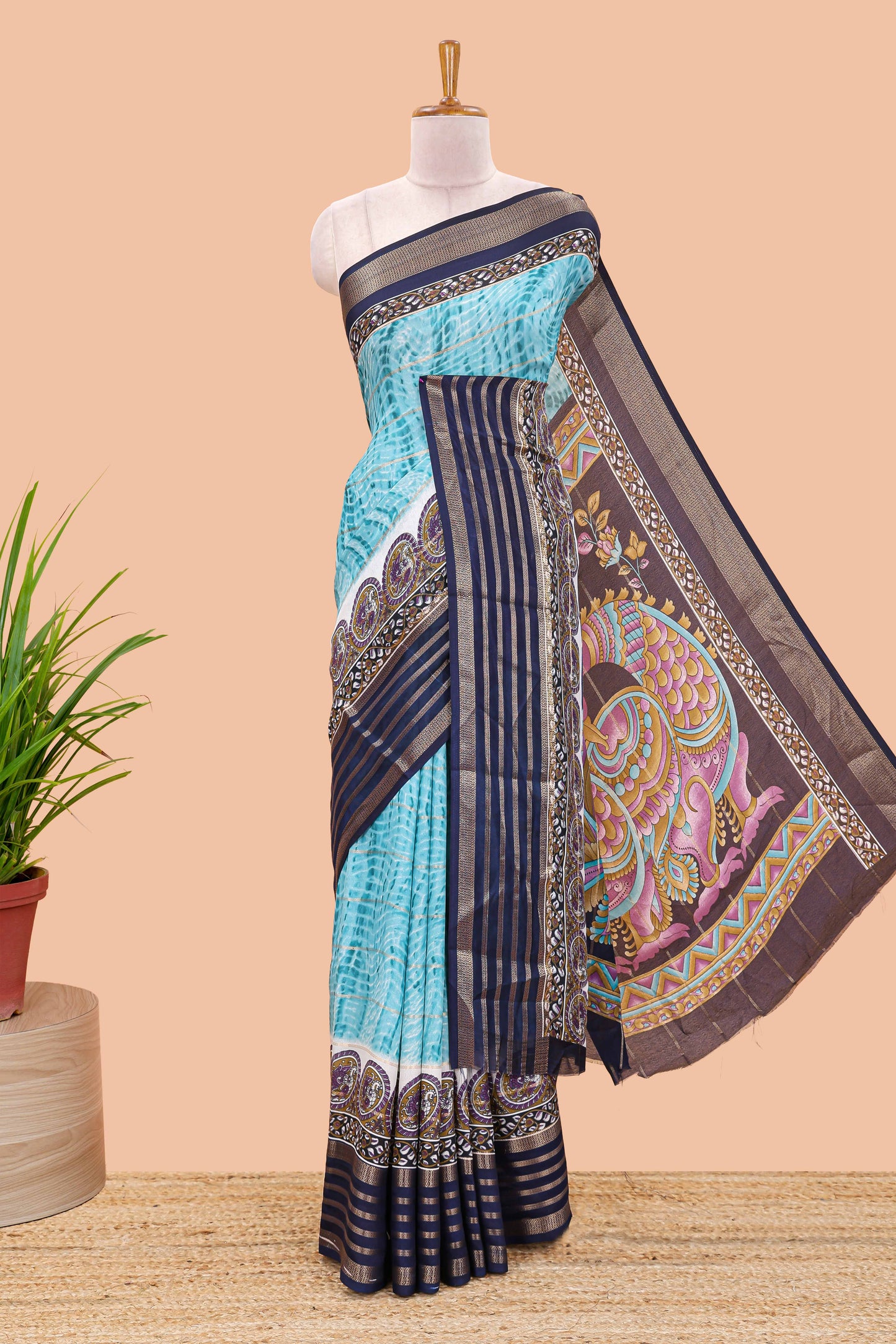 Blue marsh georgette saree with shibori print with gold zari stripes and contrast kalamkari style  peacock pallu