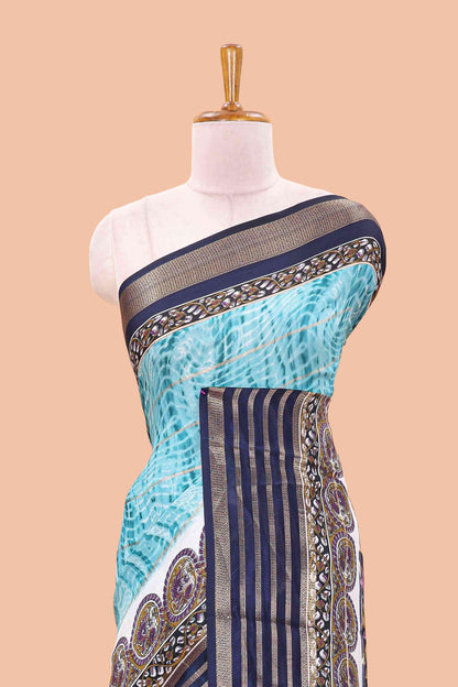 Blue marsh georgette saree with shibori print with gold zari stripes and contrast kalamkari style  peacock pallu