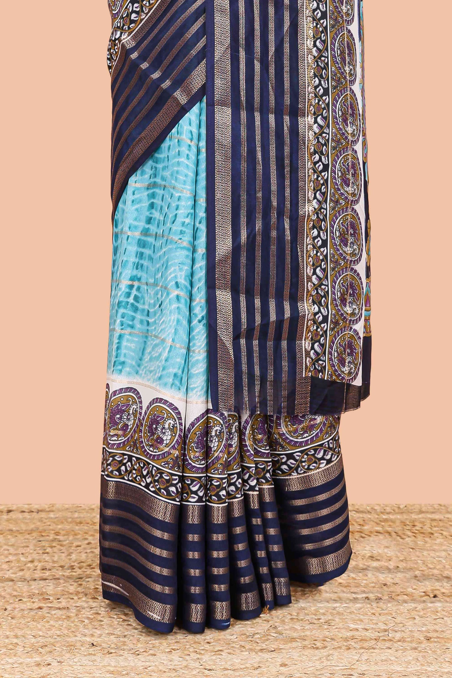 Blue marsh georgette saree with shibori print with gold zari stripes and contrast kalamkari style  peacock pallu