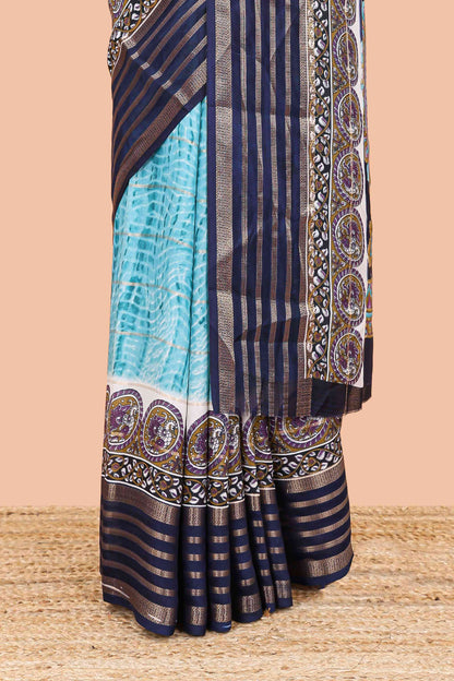 Blue marsh georgette saree with shibori print with gold zari stripes and contrast kalamkari style  peacock pallu
