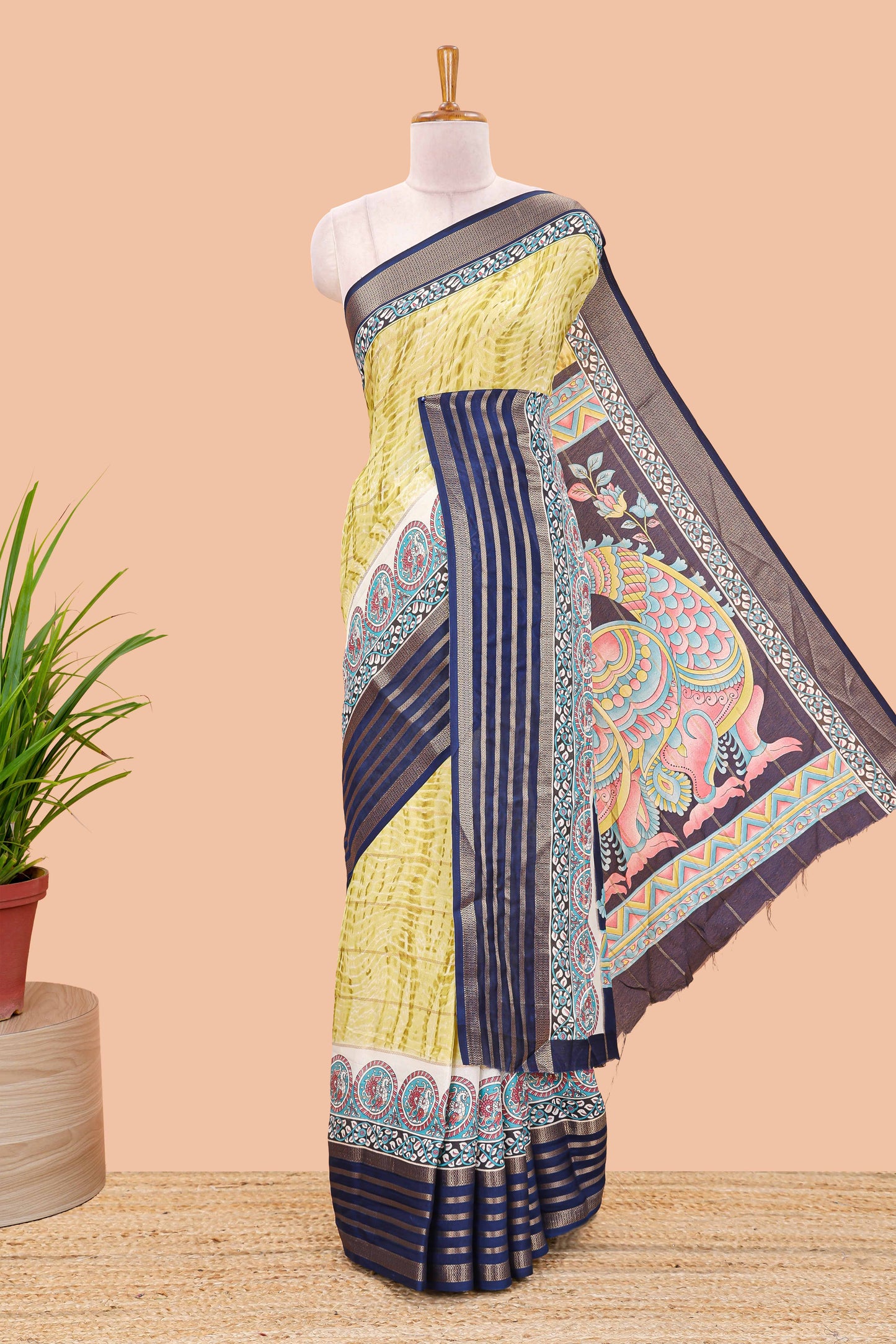 Yellow marsh georgette saree with shibori print with gold zari stripes and contrast kalamkari style  peacock pallu