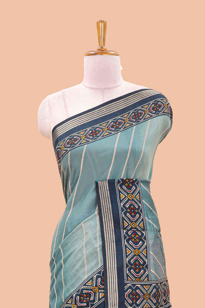 Green chanderi cotton saree featuring diagonal stripes and ikkat print pallu