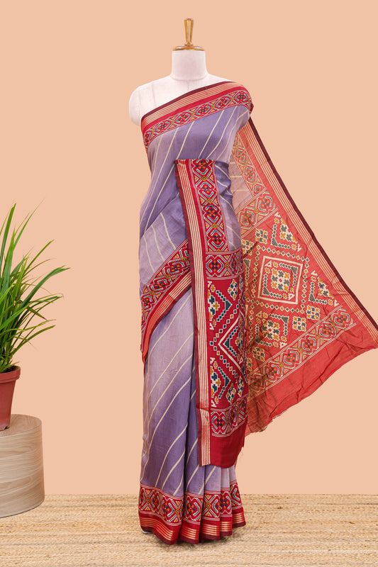 Lavender chanderi cotton saree featuring diagonal stripes and ikkat print pallu