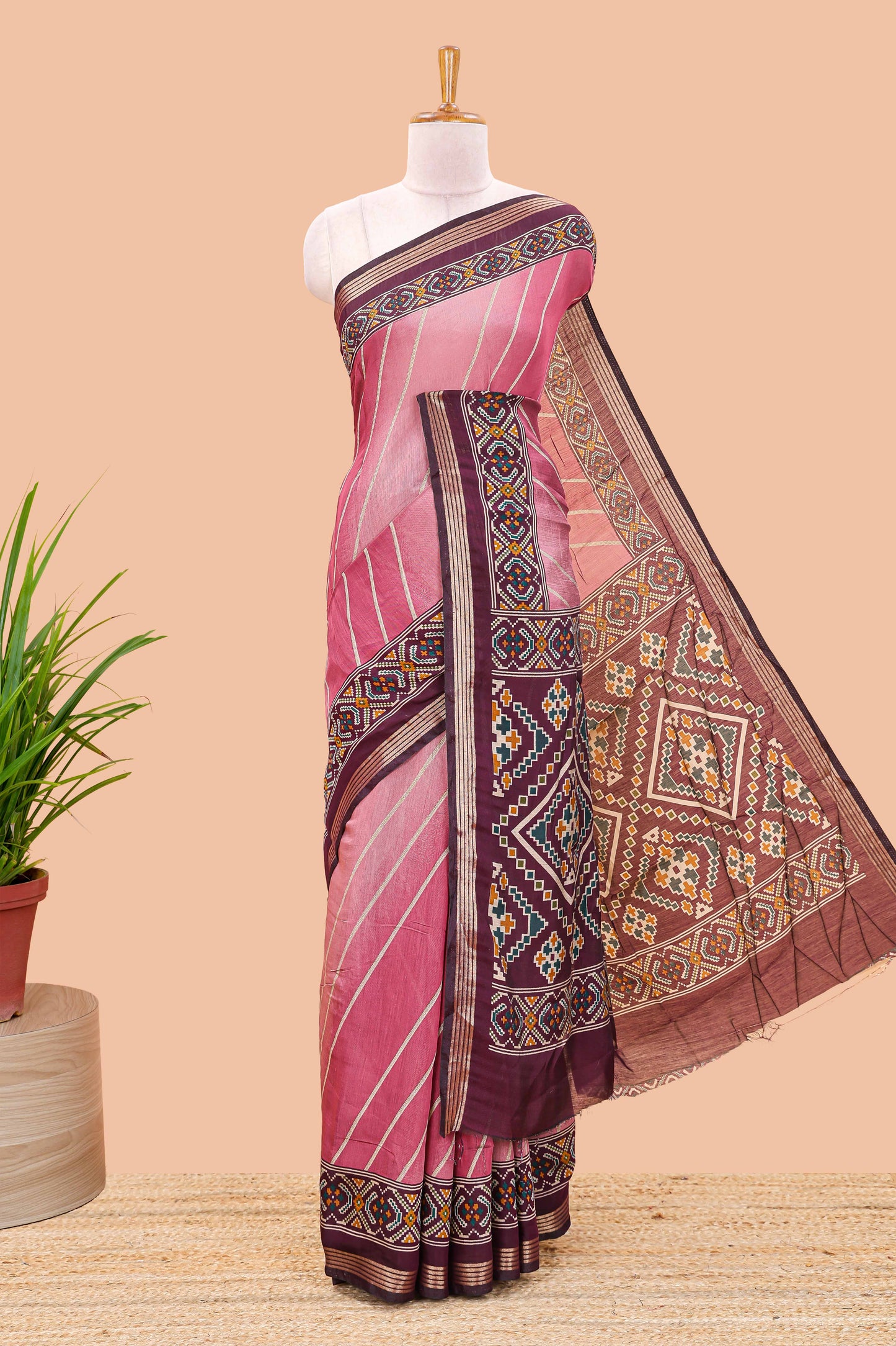 Pink chanderi cotton saree featuring diagonal stripes and ikkat print pallu