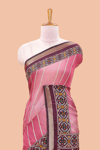 Pink chanderi cotton saree featuring diagonal stripes and ikkat print pallu