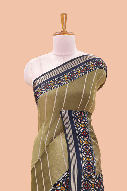 Green chanderi cotton saree featuring diagonal stripes and ikkat print pallu