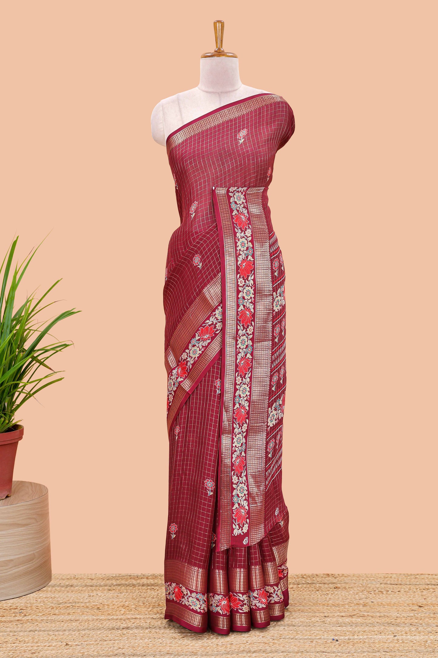 Maroon marsh georgette saree with zari checks and floral printed pallu