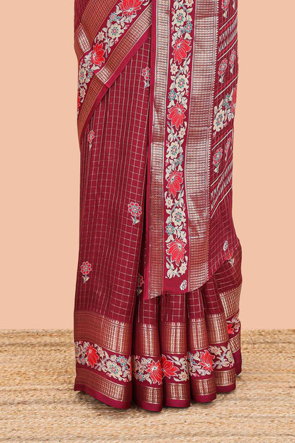 Maroon marsh georgette saree with zari checks and floral printed pallu