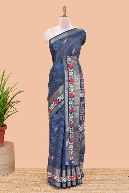 Blue marsh georgette saree with zari checks and floral printed pallu