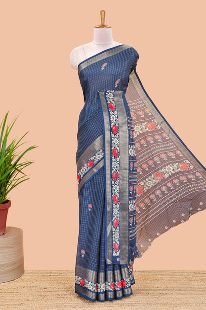 Blue marsh georgette saree with zari checks and floral printed pallu