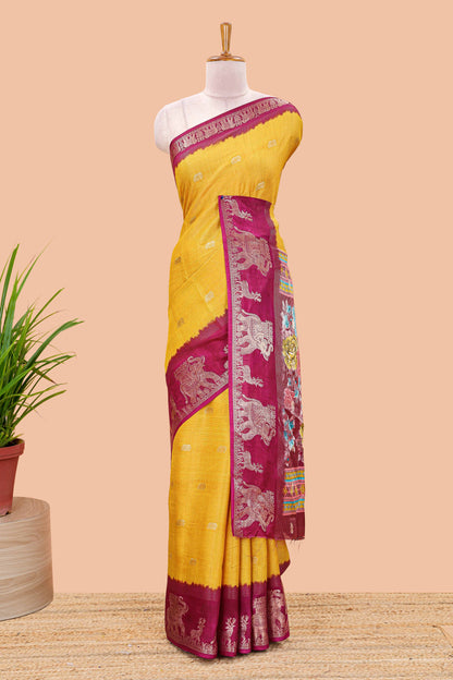 Yellow dola silk saree with elephant butta design and kalamkari print blouse