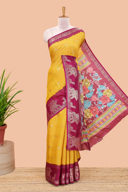 Yellow dola silk saree with elephant butta design and kalamkari print blouse