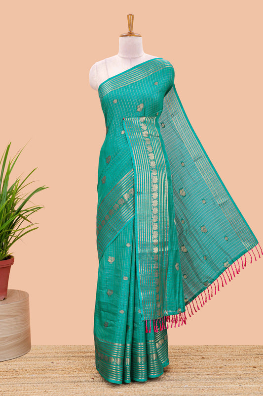 Green dola silk saree with zari checks, peacock & coin motifs and zari peacock border