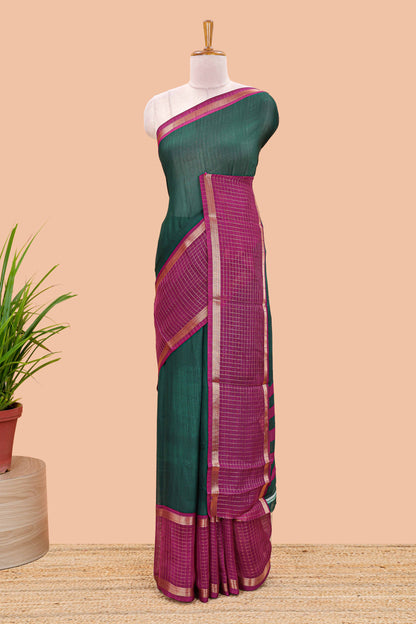 Green marsh georgette saree with classic contrast zari checked border and striped pallu