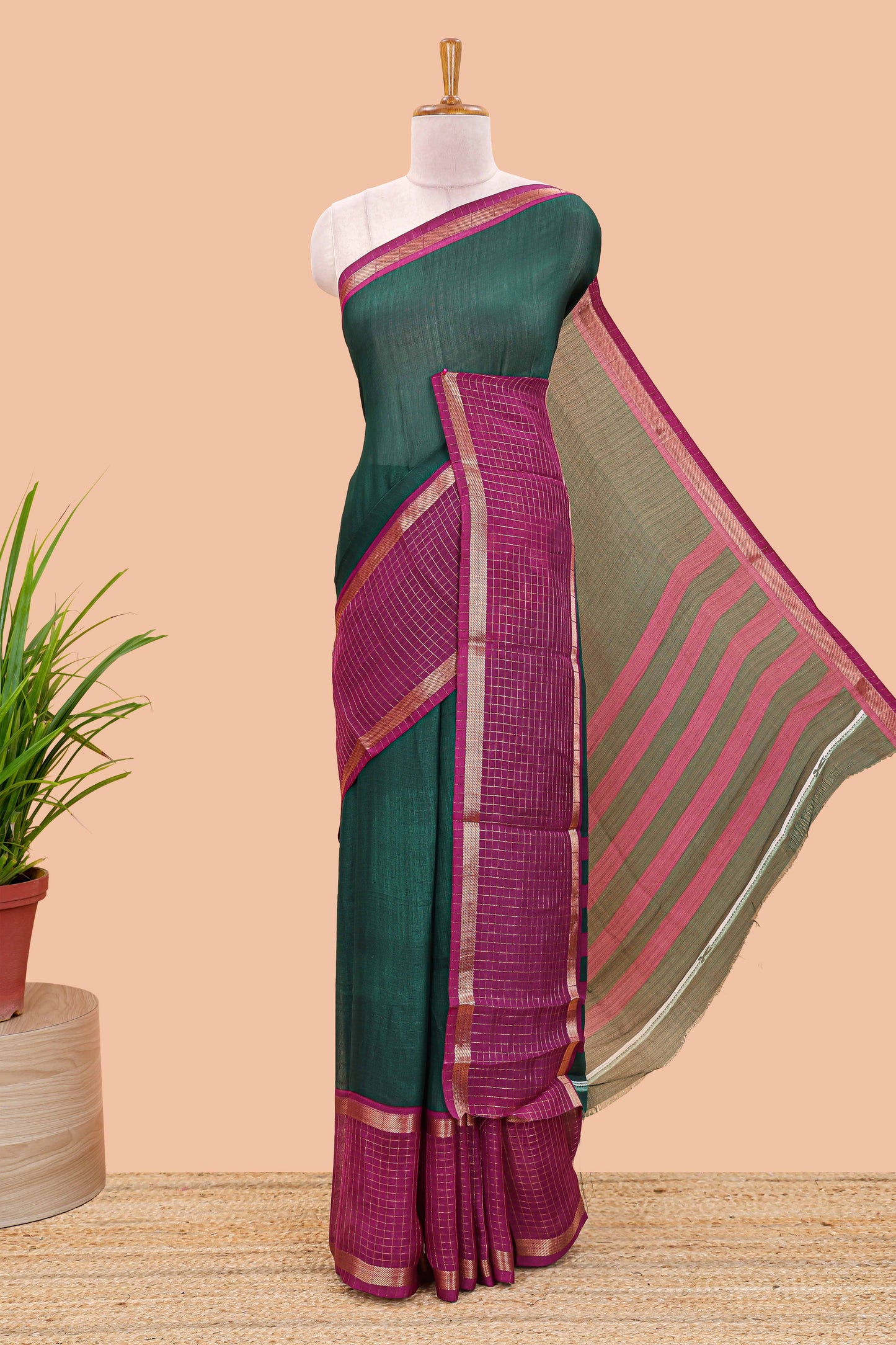 Green marsh georgette saree with classic contrast zari checked border and striped pallu