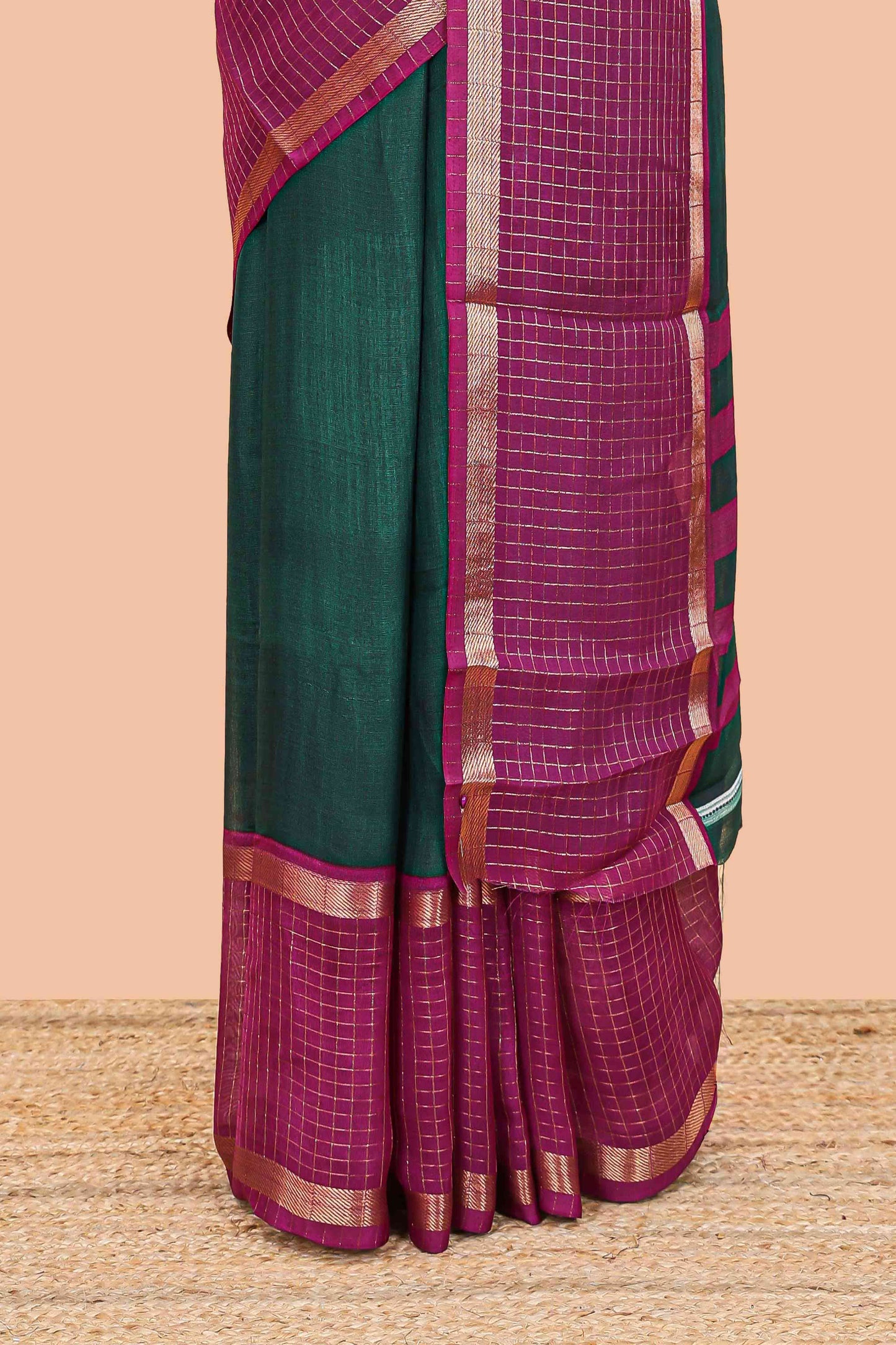 Green marsh georgette saree with classic contrast zari checked border and striped pallu