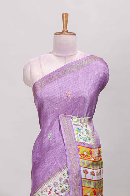 Purple dola silk saree with striped floral motifs and bird & floral bottom design with self zari border and matching blouse