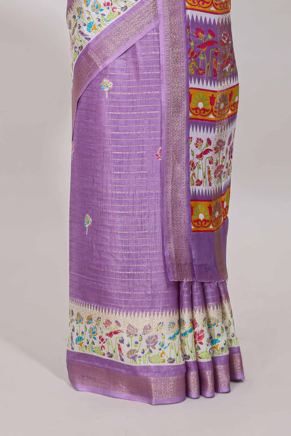 Purple dola silk saree with striped floral motifs and bird & floral bottom design with self zari border and matching blouse
