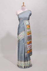 Grey dola silk saree with striped floral motifs and bird & floral bottom design with self zari border and matching blouse