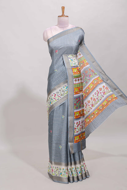 Grey dola silk saree with striped floral motifs and bird & floral bottom design with self zari border and matching blouse
