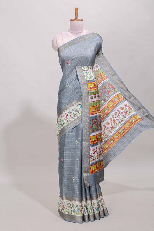 Grey dola silk saree with striped floral motifs and bird & floral bottom design with self zari border and matching blouse