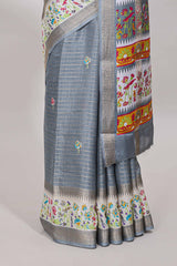 Grey dola silk saree with striped floral motifs and bird & floral bottom design with self zari border and matching blouse