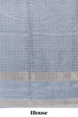 Grey dola silk saree with striped floral motifs and bird & floral bottom design with self zari border and matching blouse