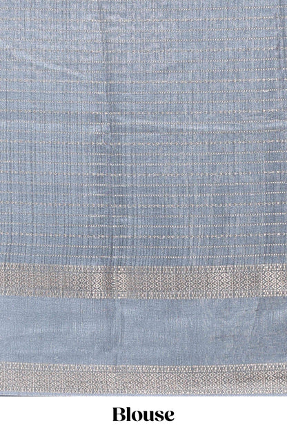 Grey dola silk saree with striped floral motifs and bird & floral bottom design with self zari border and matching blouse