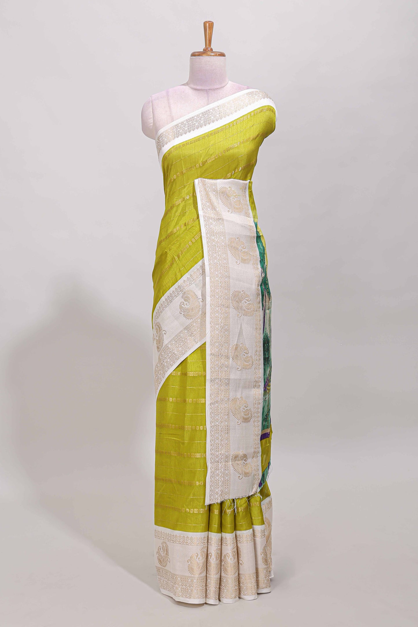Green zari striped dola silk saree with contrast zari border and printed pallu