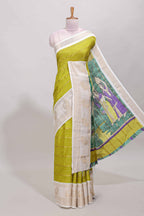 Green zari striped dola silk saree with contrast zari border and printed pallu