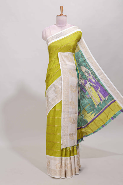 Green zari striped dola silk saree with contrast zari border and printed pallu