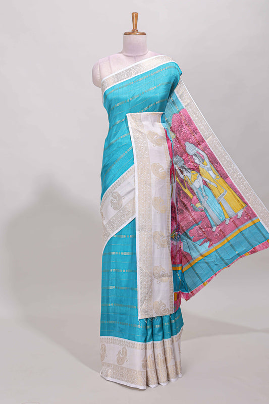 Blue zari striped dola silk saree with contrast zari border and printed pallu