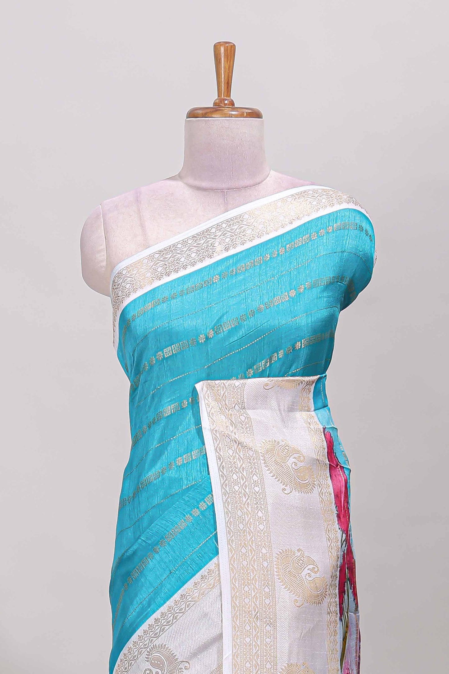 Blue zari striped dola silk saree with contrast zari border and printed pallu
