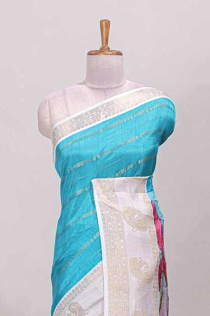 Blue zari striped dola silk saree with contrast zari border and printed pallu